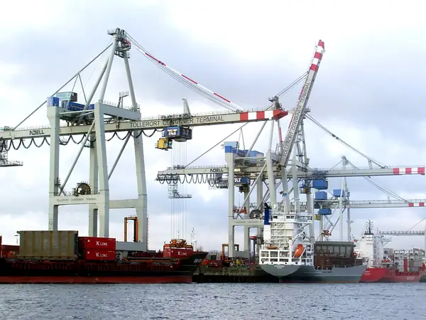 Container gantry cranes at a port terminal — illustrative photo