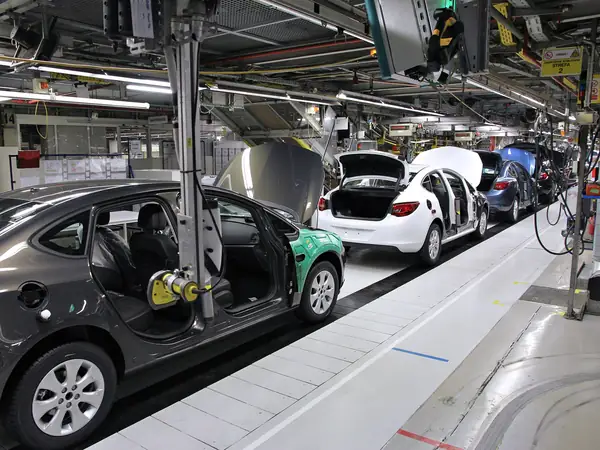 Car factory assembly line — illustrative photo