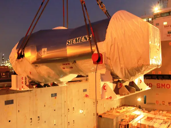 Siemens industrial gas turbine being loaded onto a ship — illustrative photo